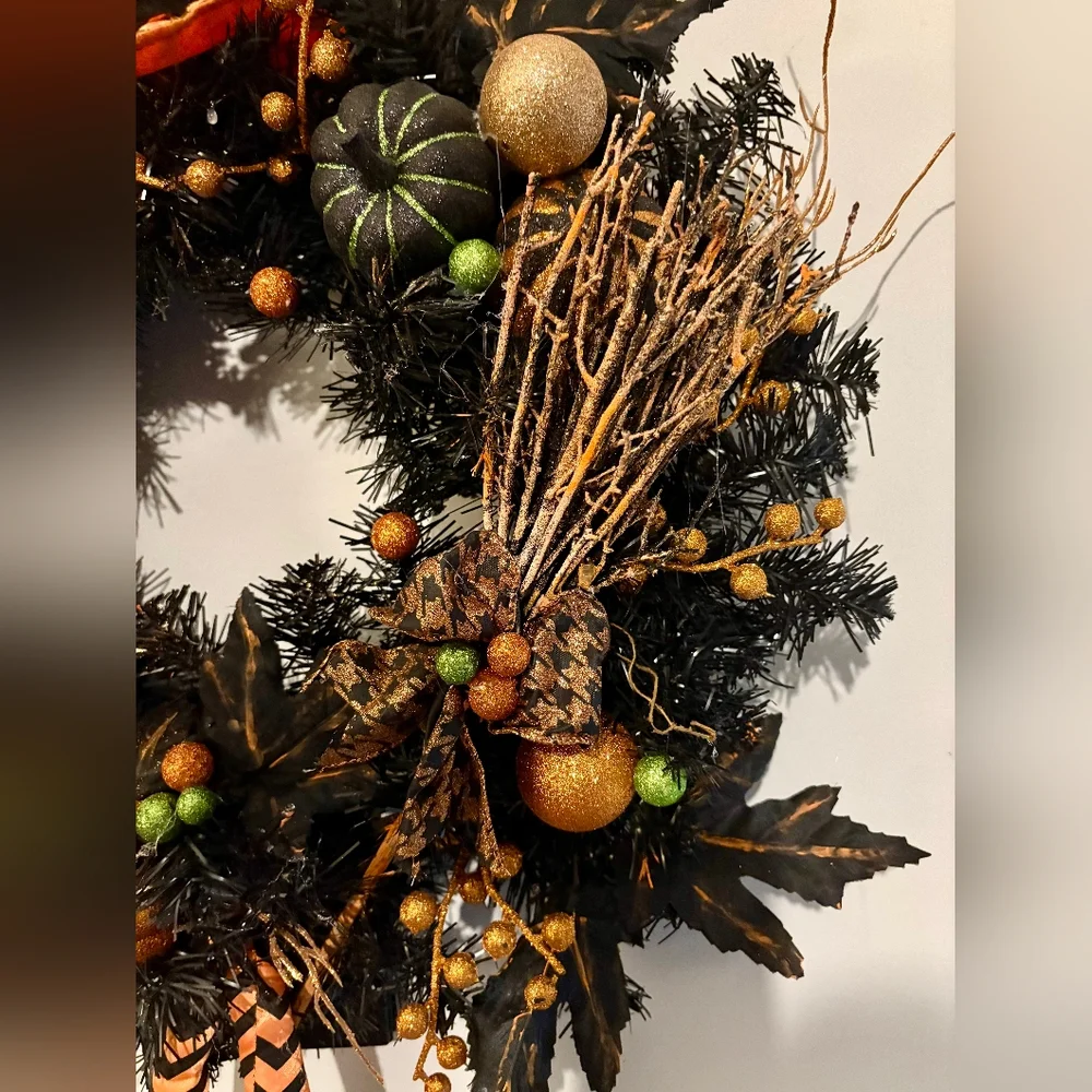 Festive Halloween Wreath with Orange and Black Accents